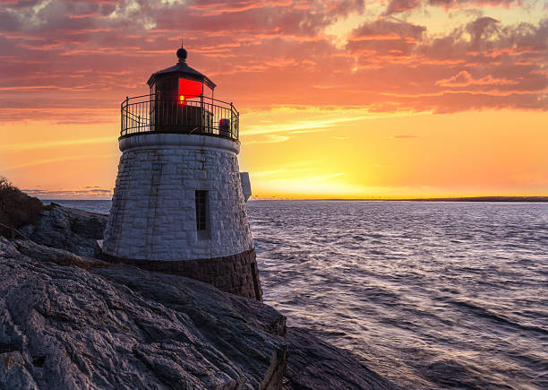 istock Castle Hill Lighthouse in orange sunset 584466826