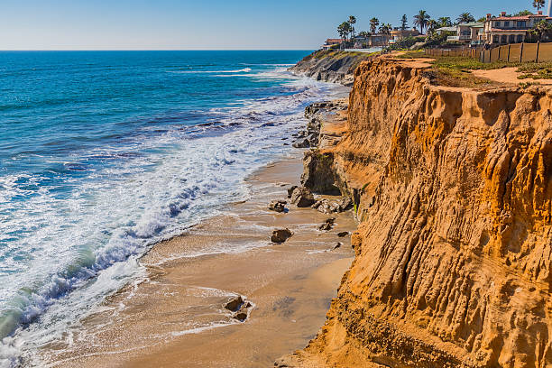 istock Eroded cliff of Carlsbad with breaking surf, CA 584467828