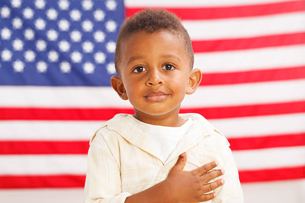 istock African-American patriotic boy 584469018