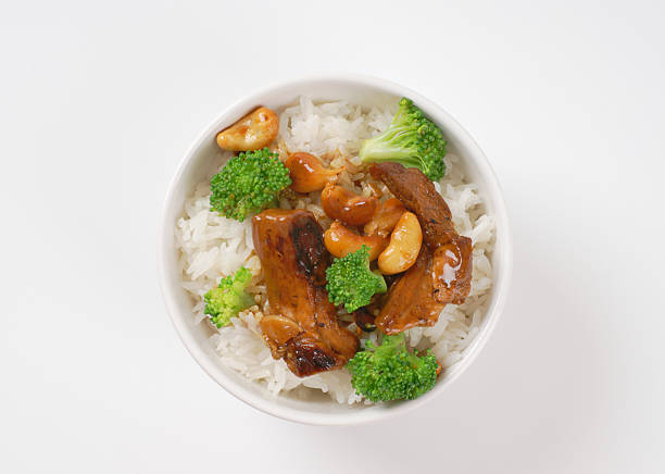 istock Beef and cashew stir fry with rice 584470686