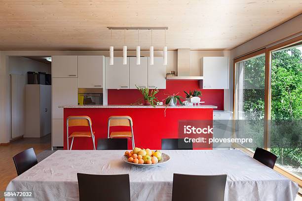 Interior Dining Table And Kitchen Stock Photo - Download Image Now - Kitchen, Red, Wall - Building Feature
