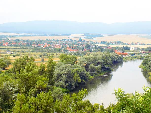 istock Village near river 584473062