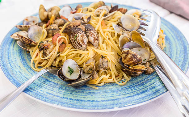 istock Real Spaghetti alle vongole in Naples, Italy 584475788