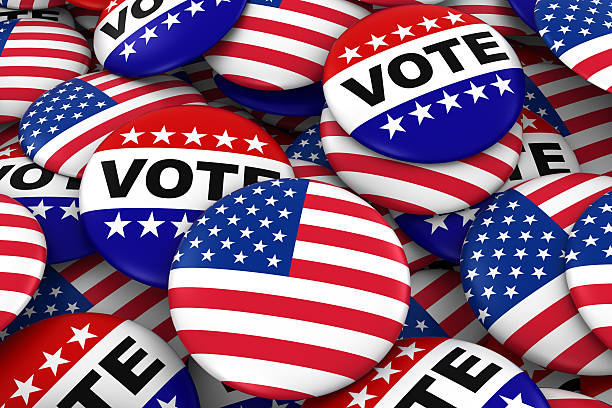 US Elections Concept - United States Flag and Vote Badges stock photo