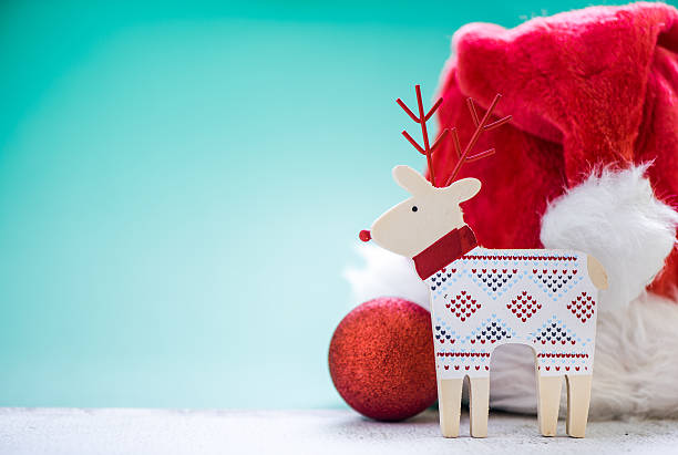 istock santa red hat and vintage christmas toy 584478224