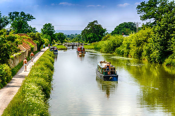 Devizes, UK - June 8, 2008: People and Narrowboats on the kennet & Avon canal, Devizes, UK