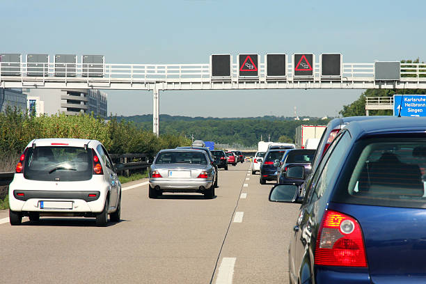 cars in traffic jam on highway, in germany - traffic jam traffic germany car imagens e fotografias de stock