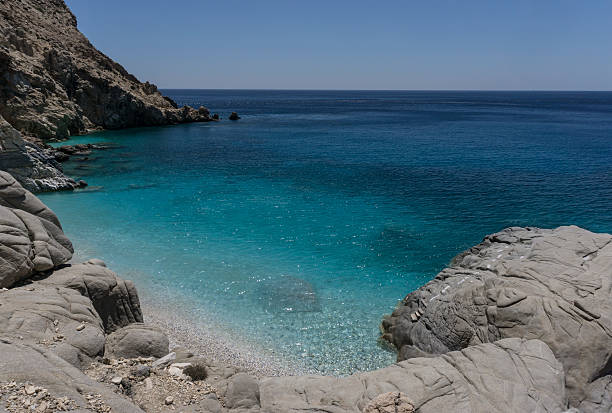 Greek Islands Magnificent Seychelles beach in Ikaria, Greece ikaria island stock pictures, royalty-free photos & images