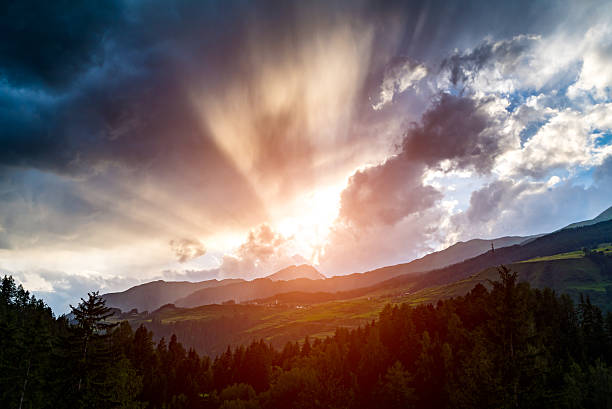 Spectacular sunset in mountains stock photo