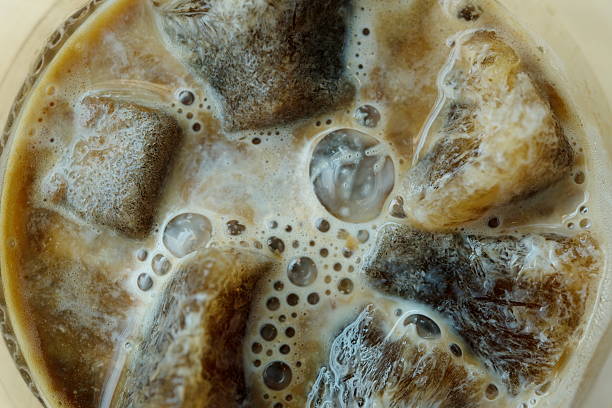 istock Ice coffee and Coffee on wooden table in coffee shop 584489946