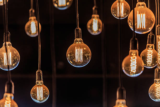 istock glowing round tungsten lamps 584490272
