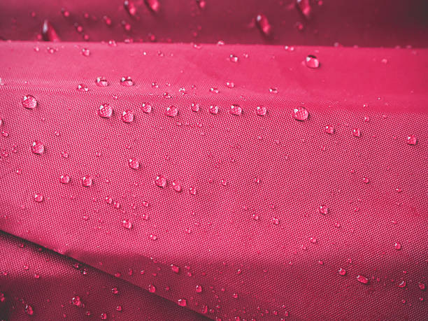 istock Drops of water on a cloth covering 584493250