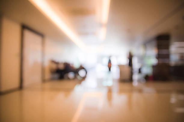 istock Blurry indoor hall of office backgound 584497438