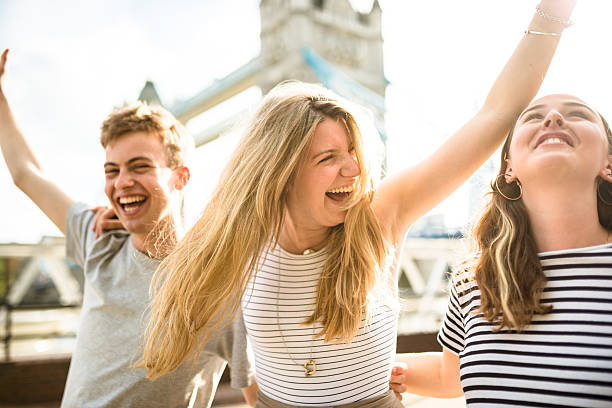 istock friends walking and have fun in London 584498708