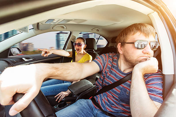 istock Couple driving in the car 584500220