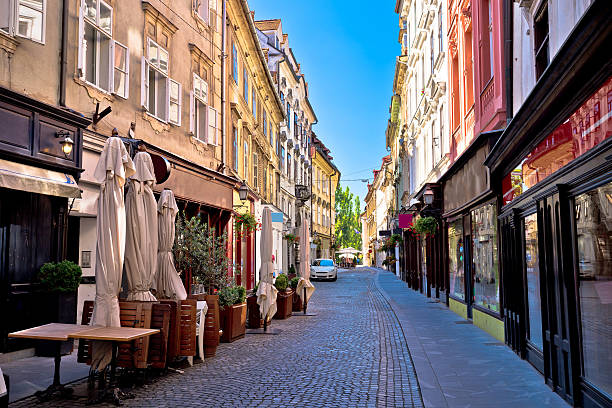 istock Old Ljubljana cobbled street view 584503102