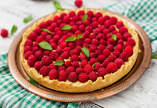 istock Tart with raspberries and whipped cream 584503550