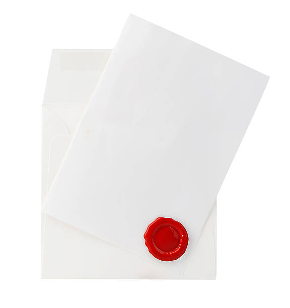 istock Mail envelope with letter and red wax seal close-up. 584504214