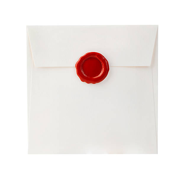 istock Mail envelope with red wax seal close-up isolated. 584504250