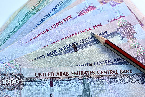 istock Close up Dirhams currency, United Arab Emirates 584506604