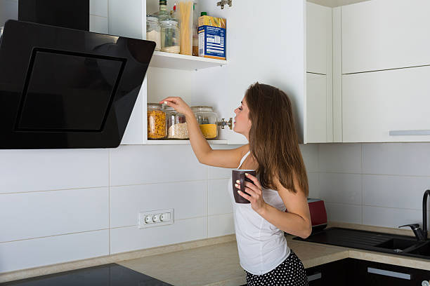 istock Woman at her kitchen in the morning 584508656