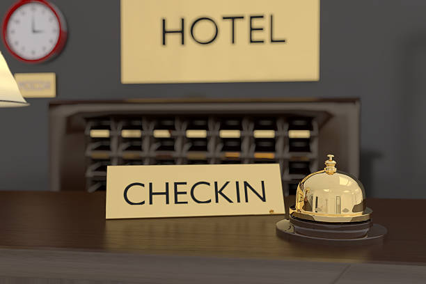 istock 3D rendering of golden bell at hotel reception 584510802