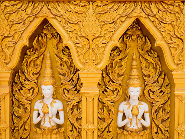 istock Beautiful golden temple wall in Thailand. 584512044