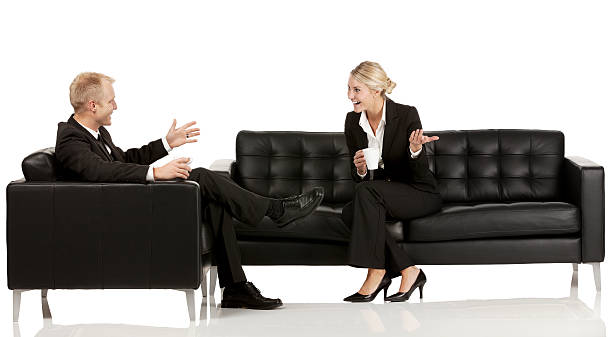 istock Smiling business colleague discussion 584565736