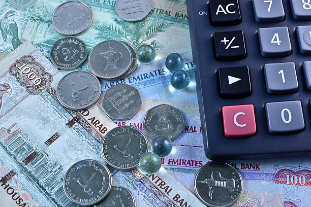 istock Close up Dirhams currency, United Arab Emirates 584565982