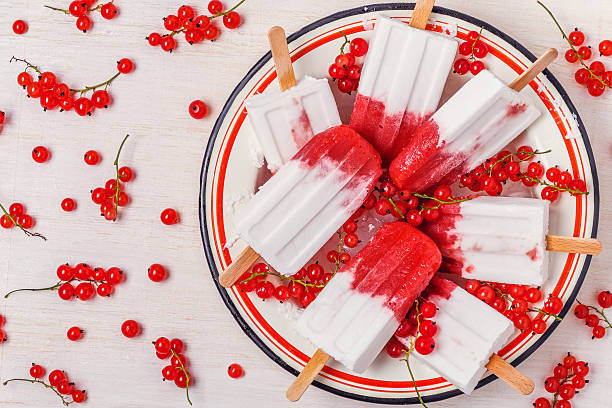 istock Homemade berries and coconut milk popsicles. 584566430