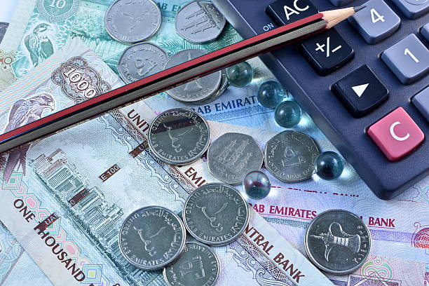 istock Close up Dirhams currency, United Arab Emirates 584566608
