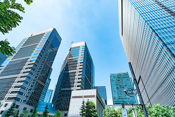 istock High-rise buildings and blue sky - Tokyo, Japan 584567704