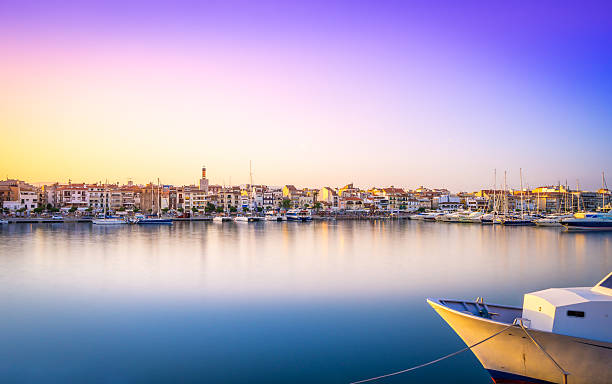 Landscape from the port of Cambrils , Spain Cambrils, Spain - July 30, 2016: Landscape from the port of Cambrils at sunset, with nice blue-magenta sky cambrils stock pictures, royalty-free photos & images