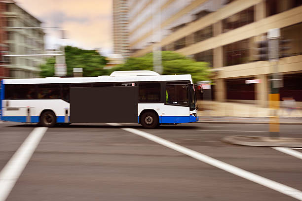 City bus in and motion blur. Copy space for ad on bus.