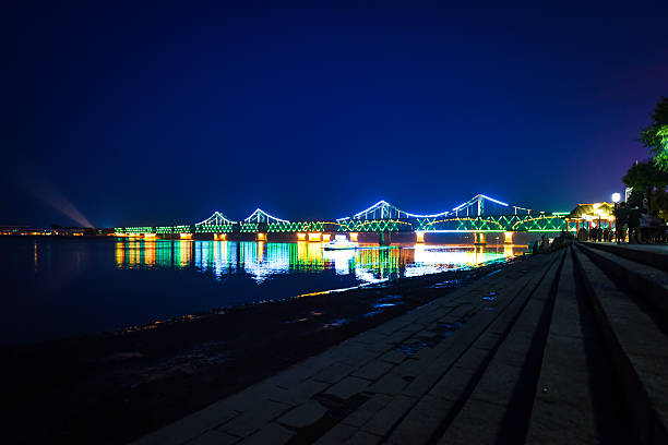 istock Yalu River Bridge in the night 584574300