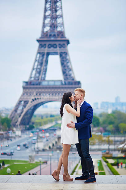 istock Romantic couple in Paris near the Eiffel tower 584574948