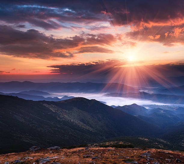 istock Colorful panoramic sunrise in the mountains landscape. 584574978