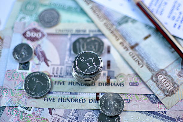 istock Close up Dirhams currency, United Arab Emirates 584575122
