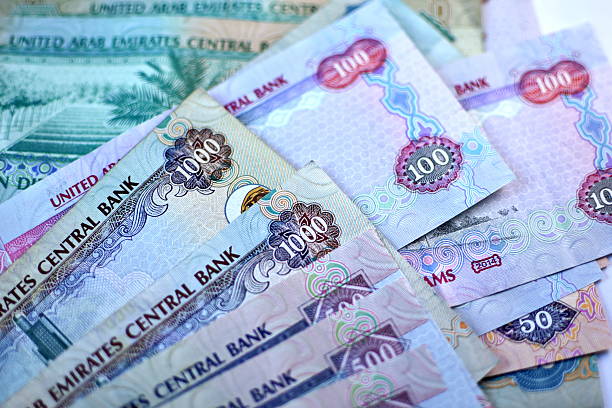 istock Close up Dirhams currency, United Arab Emirates 584575822