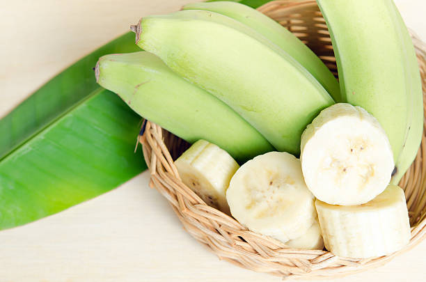 istock Banana fruit sliced on basket with leaf 584578342