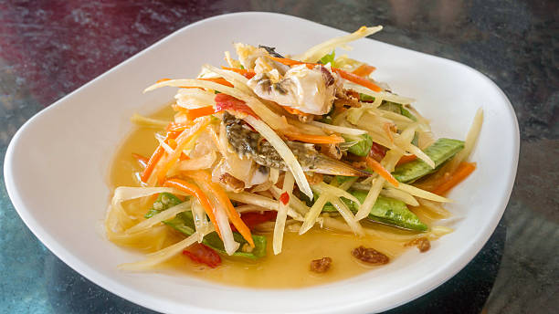 istock Thai food papaya salad 584580784