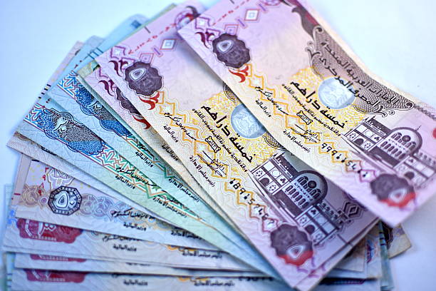 istock Close up Dirhams currency, United Arab Emirates 584581800