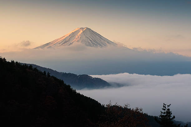 istock Mount Fuji with mist at sunrise, Japan 584582668