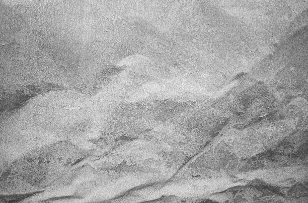 Abstract black and white photo of sand surface on a beach