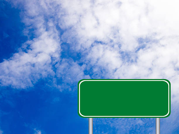 istock Blank green transportation on blue sky with white cloud background 584582788