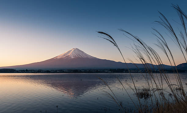 istock Mountain Fuji and reflections on lake Kawaguchi at dawn 584584948