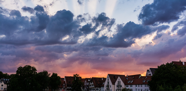 Deep Burning Red Purple Blue Ray Sunset over German Cottages in Ulm
