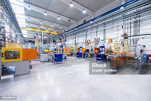 Futuristic Machinery In Production Line Stock Photo - Download Image Now - Factory, Manufacturing, Industry