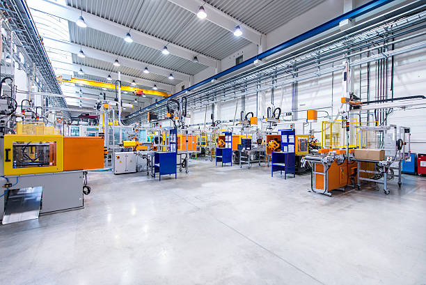 futuristic machinery in production line - factory floor imagens e fotografias de stock