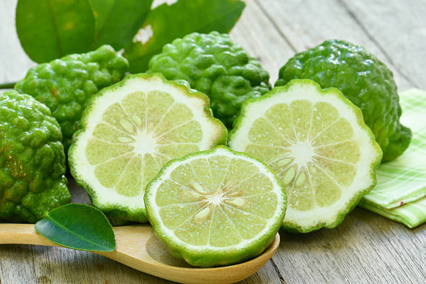 Bergamot Bergamot slice on the table kaffir stock pictures, royalty-free photos & images